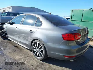 2012 Volkswagen Jetta GLI Autobahn with VIN 3VW5A7AJ5CM378588, listed as a IAAI auction lot 41318511 with 84,703 mi miles and . Bid and sale history available at DreamBid. Image 3.