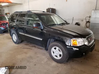 2003 GMC Envoy SLT with VIN 1GKDT13S732208692, listed as a Copart auction lot 67475514 with 243,146 mi miles and Salvage Title. Bid and sale history available at carsss.com. Image 4.