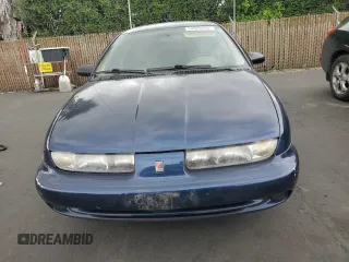 1998 Saturn SL z VIN 1G8ZK5277WZ174641, wystawiony jako Copart lot #54620995 z przebiegiem 109 742 mil mil oraz Szkody całkowita. Historia ofert i sprzedaży dostępna na DreamBid. Obrazek 5.