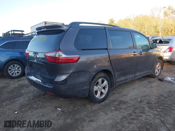 2015 Toyota Sienna LE AAS with VIN 5TDKK3DC2FS678943, listed as a IAAI auction lot 41184022 with 161,120 mi miles. Bid and sale history available at carsss.com. Image 4.
