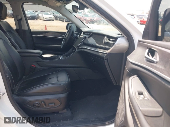 2023 Jeep Grand Cherokee with VIN 1C4RJYB63PC649000, listed as a IAAI auction lot 42306975 with 29,948 mi miles and . Bid and sale history available at DreamBid. Image 5.