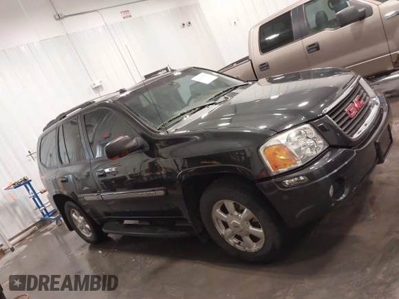 2005 GMC Envoy SLT z VIN 1GKDT13S852281122, wystawiony jako IAAI lot #42292577 z przebiegiem 156 052 mil mil oraz . Historia ofert i sprzedaży dostępna na DreamBid. Obrazek 13.