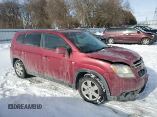 2013 Chevrolet Orlando z VIN KL77P2ETXDK135244, wystawiony jako Copart lot #41415545 z przebiegiem 170 233 mil mil oraz Tytuł czysty. Historia ofert i sprzedaży dostępna na DreamBid. Obrazek 4.