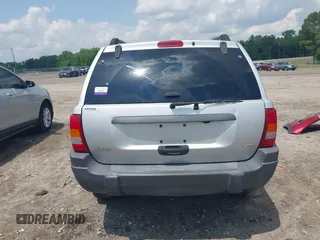 2004 Jeep Grand Cherokee Laredo with VIN 1J4GX48N04C435603, listed as a IAAI auction lot 42274197 with 256,163 mi miles and . Bid and sale history available at DreamBid. Image 16.