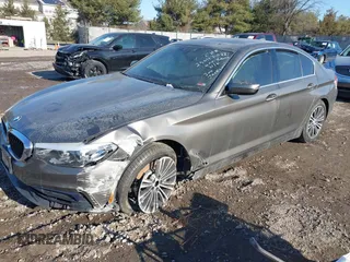 2019 BMW 5 Series 530i xDrive with VIN WBAJA7C54KWW40517, listed as a IAAI auction lot 41427443 with 51,028 mi miles. Bid and sale history available at carsss.com. Image 2.