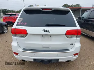 2014 Jeep Grand Cherokee Overland with VIN 1C4RJECG4EC543092, listed as a IAAI auction lot 40981315 with 149,096 mi miles. Bid and sale history available at carsss.com. Image 17.