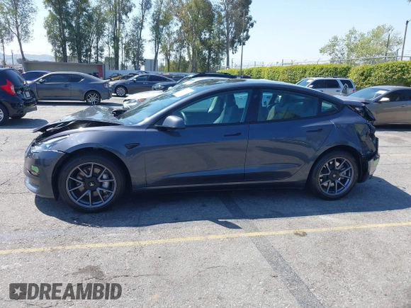 2023 Tesla Model 3 Long Range with VIN 5YJ3E1EB4PF635328, listed as a IAAI auction lot 41978099 with 32,747 mi miles and . Bid and sale history available at DreamBid. Image 14.