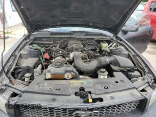 2005 Ford Mustang Deluxe z VIN 1ZVFT80N755258602, wystawiony jako Copart lot #57840845 z przebiegiem 155 278 mil mil oraz Szkoda całkowita • Salvage title. Historia ofert i sprzedaży dostępna na DreamBid. Obrazek 11.