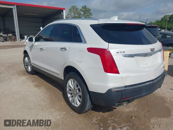 2017 Cadillac XT5 FWD with VIN 1GYKNARS0HZ107734, listed as a IAAI auction lot 41882031 with 89,397 mi miles. Bid and sale history available at carsss.com. Image 3.