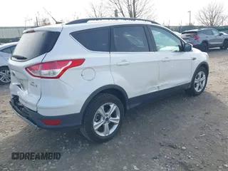 2014 Ford Escape SE with VIN 1FMCU0GX1EUB23743, listed as a IAAI auction lot 40893420 with 74,506 mi miles. Bid and sale history available at carsss.com. Image 4.