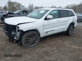 2016 Jeep Grand Cherokee Limited 75th Anniversary with VIN 1C4RJFBG5GC377529, listed as a IAAI auction lot 41961815 with 136,297 mi miles and . Bid and sale history available at DreamBid. Image 18.