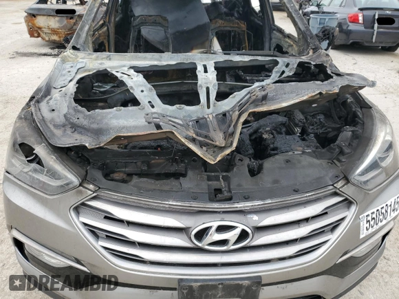 2017 Hyundai Santa Fe 2.4L z VIN 5NMZUDLB0HH042101, wystawiony jako Copart lot #55058145 z przebiegiem Nie podano mil oraz Szkoda całkowita • Salvage title. Historia ofert i sprzedaży dostępna na DreamBid. Obrazek 11.