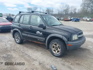 2001 Chevrolet Tracker ZR2 z VIN 2CNBJ734916938029, wystawiony jako IAAI lot #42171767 z przebiegiem 107 703 mil mil oraz . Historia ofert i sprzedaży dostępna na DreamBid. Obrazek 1.
