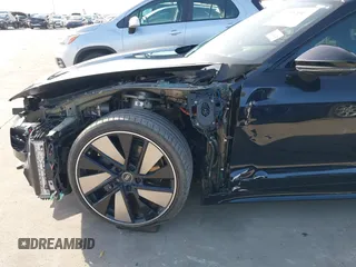 2024 Audi e-tron GT Prestige z VIN WAUEJBFW6R7002606, wystawiony jako IAAI lot #41797047 z przebiegiem 6 184 mil mil oraz . Historia ofert i sprzedaży dostępna na DreamBid. Obrazek 20.