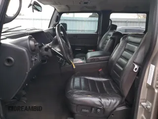 2006 Hummer H2 with VIN 5GRGN23U16H121476, listed as a Copart auction lot 86902654 with 143,202 mi miles and Salvage Title. Bid and sale history available at carsss.com. Image 7.