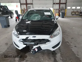 2017 Ford Focus SE с VIN 1FADP3F21HL303635, выставлен на аукционе IAAI как лот 42423956 с пробегом 87 952 миль миль и . История ставок и продаж доступна на DreamBid. Изображение 13.
