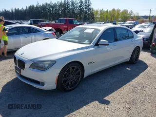 2009 BMW 7 Series 750Li with VIN WBAKB83549CY59299, listed as a IAAI auction lot 42040718 with 129,236 mi miles. Bid and sale history available at carsss.com. Image 2.