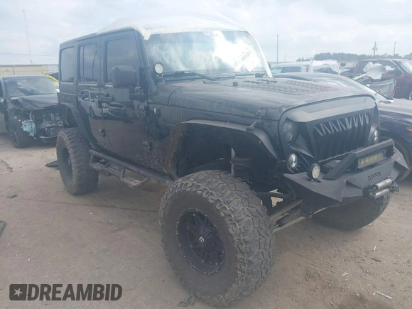 2014 Jeep Wrangler Unlimited Rubicon X with VIN 1C4HJWFG3EL274905, listed as a IAAI auction lot 41512631 with 123,961 mi miles and . Bid and sale history available at DreamBid. Image 1.