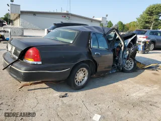 1999 Ford Crown Victoria LX with VIN 2FAFP74WXXX235990, listed as a Copart auction lot 69134854 with 174,636 mi miles and Non Repairable. Bid and sale history available at carsss.com. Image 3.