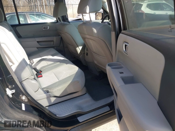 2014 Honda Pilot LX with VIN 5FNYF4H22EB015512, listed as a IAAI auction lot 41753515 with 152,287 mi miles and . Bid and sale history available at DreamBid. Image 8.