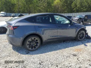 2022 Tesla Model Y Long Range z VIN 7SAYGDEE9NA014319, wystawiony jako Copart lot #53003555 z przebiegiem Nie podano mil oraz Szkody całkowita. Historia ofert i sprzedaży dostępna na DreamBid. Obrazek 3.