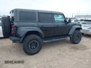 2023 Ford Bronco Raptor with VIN 1FMEE5JR0PLB23237, listed as a IAAI auction lot 41571428 with 25,530 mi miles. Bid and sale history available at carsss.com. Image 4.