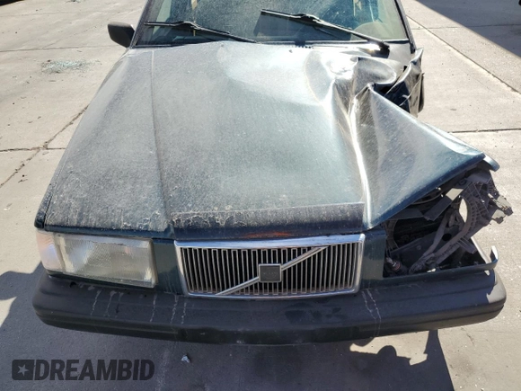 1994 Volvo 900 z VIN YV1JS8615R1180199, wystawiony jako Copart lot #76126714 z przebiegiem 131 713 mil mil oraz Szkoda całkowita • Salvage title. Historia ofert i sprzedaży dostępna na DreamBid. Obrazek 11.