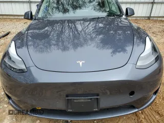 2023 Tesla Model Y Long Range z VIN 7SAYGDEE5PA164270, wystawiony jako Copart lot #50260835 z przebiegiem 17 340 mil mil oraz Szkoda całkowita • Salvage title. Historia ofert i sprzedaży dostępna na DreamBid. Obrazek 13.