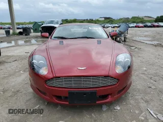 2005 Aston Martin DB9 z VIN SCFAD01A15GA00012, wystawiony jako Copart lot #65919164 z przebiegiem Nie podano mil oraz Szkody całkowita. Historia ofert i sprzedaży dostępna na DreamBid. Obrazek 5.