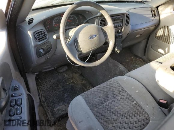 2003 Ford F-150 XLT with VIN 1FTRW08623KD45425, listed as a Copart auction lot 77605404 with 174,369 mi miles and Salvage Title. Bid and sale history available at carsss.com. Image 8.