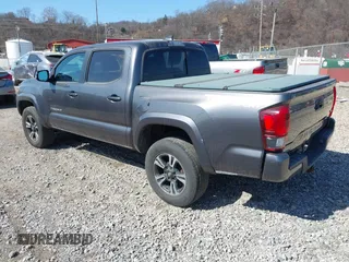 2018 Toyota Tacoma SR with VIN 5TFCZ5AN9JX123749, listed as a IAAI auction lot 41768884 with 42,852 mi miles and . Bid and sale history available at DreamBid. Image 3.