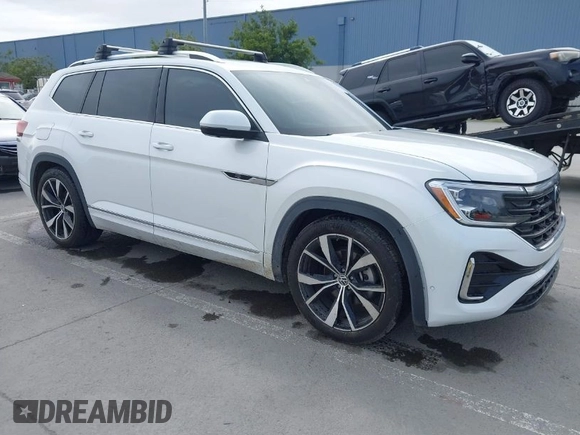 2024 Volkswagen Atlas SEL Premium R-Line z VIN 1V2FR2CA6RC547798, wystawiony jako IAAI lot #41723656 z przebiegiem 27 146 mil mil oraz . Historia ofert i sprzedaży dostępna na DreamBid. Obrazek 1.