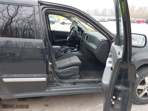 2009 Jeep Grand Cherokee Laredo with VIN 1J8GR48K19C546439, listed as a IAAI auction lot 42097256 with 146,930 mi miles. Bid and sale history available at carsss.com. Image 5.