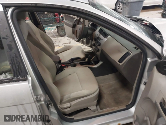 2009 Ford Focus S with VIN 1FAHP34N99W107098, listed as a IAAI auction lot 41610814 with 80,428 mi miles. Bid and sale history available at carsss.com. Image 5.
