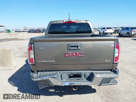 2015 GMC Canyon 2WD SLT with VIN 1GTG5CE32F1215628, listed as a IAAI auction lot 41412762 with 182,615 mi miles. Bid and sale history available at carsss.com. Image 16.