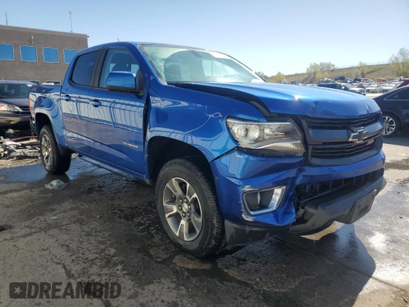 2020 Chevrolet Colorado 4WD Z71 with VIN 1GCGTDEN5L1104824, listed as a Copart auction lot 55125315 with 96,805 mi miles and Salvage title. Bid and sale history available at DreamBid. Image 4.