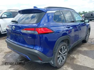2023 Toyota Corolla Cross XLE with VIN 7MUEAAAG7PV065106, listed as a IAAI auction lot 42168195 with 6,519 mi miles and . Bid and sale history available at DreamBid. Image 4.