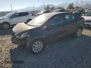 2015 Kia Rio EX with VIN KNADN4A33F6480556, listed as a Copart auction lot 79883294 with 141,136 mi miles and Salvage Title. Bid and sale history available at carsss.com. Image 1.