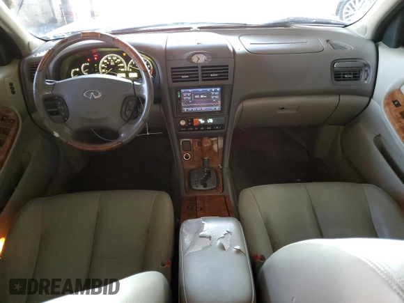 2004 Infiniti I35 z VIN JNKDA31A84T212784, wystawiony jako Copart lot #57489145 z przebiegiem 152 439 mil mil oraz Szkoda całkowita • Salvage title. Historia ofert i sprzedaży dostępna na DreamBid. Obrazek 8.