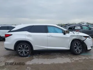 2018 Lexus RX 350L Premium z VIN JTJDZKCAXJ2010125, wystawiony jako IAAI lot #41899420 z przebiegiem 113 995 mil mil oraz . Historia ofert i sprzedaży dostępna na DreamBid. Obrazek 13.