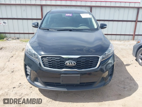 2019 Kia Sorento L z VIN 5XYPG4A39KG534430, wystawiony jako IAAI lot #42255655 z przebiegiem 167 437 mil mil oraz . Historia ofert i sprzedaży dostępna na DreamBid. Obrazek 12.