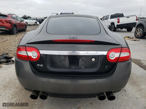 2011 Jaguar XK with VIN SAJWA4DC7BMB40355, listed as a Copart auction lot 88007985 with 0 mi miles and Salvage Title. Bid and sale history available at carsss.com. Image 6.