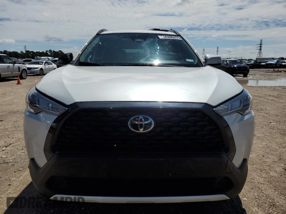 2023 Toyota Corolla Cross LE z VIN 7MUCAAAG1PV066534, wystawiony jako Copart lot #56206465 z przebiegiem 20 792 mil mil oraz Szkoda całkowita • Salvage title. Historia ofert i sprzedaży dostępna na DreamBid. Obrazek 5.