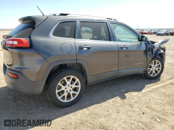 2015 Jeep Cherokee Latitude z VIN 1C4PJMCB2FW734385, wystawiony jako Copart lot #57333805 z przebiegiem 121 249 mil mil oraz Szkoda całkowita • Salvage title. Historia ofert i sprzedaży dostępna na DreamBid. Obrazek 3.
