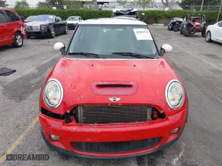 2009 MINI Cooper Hardtop S with VIN WMWMF73549TW87458, listed as a IAAI auction lot 42051759 with 135,309 mi miles. Bid and sale history available at carsss.com. Image 12.