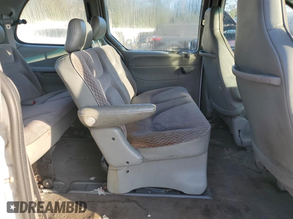 2000 Plymouth Voyager z VIN 2P4GP2534YR645983, wystawiony jako Copart lot #80028904 z przebiegiem Nie podano mil oraz Szkody całkowita. Historia ofert i sprzedaży dostępna na DreamBid. Obrazek 11.