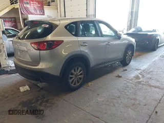 2016 Mazda CX-5 Sport with VIN JM3KE2BE5G0720507, listed as a IAAI auction lot 41872003 with 160,727 mi miles and . Bid and sale history available at carsss.com. Image 4.
