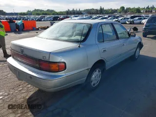 1994 Toyota Camry LE z VIN JT2SK12E0R0209312, wystawiony jako IAAI lot #42197159 z przebiegiem 270 657 mil mil oraz . Historia ofert i sprzedaży dostępna na DreamBid. Obrazek 4.
