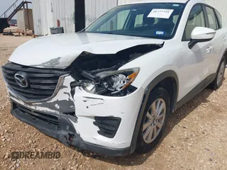 2016 Mazda CX-5 Sport with VIN JM3KE2BYXG0683318, listed as a IAAI auction lot 41777751 with 116,922 mi miles. Bid and sale history available at carsss.com. Image 19.