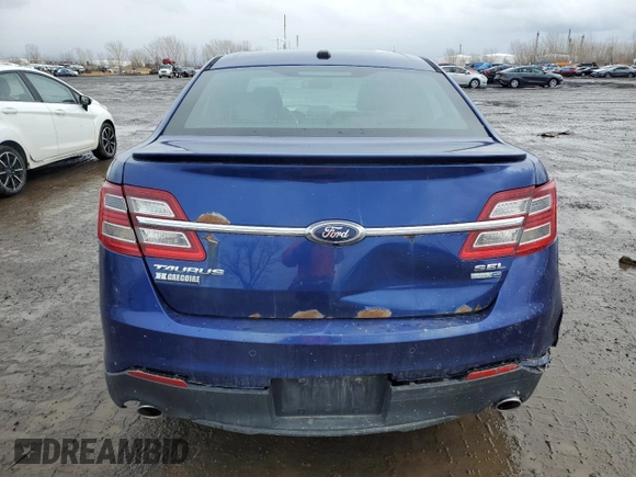 2013 Ford Taurus SEL with VIN 1FAHP2H80DG115530, listed as a Copart auction lot 50353005 with 194,515 mi miles and Salvage Title. Bid and sale history available at DreamBid. Image 6.
